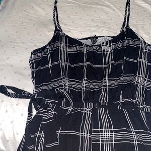 Grid Patterned Jumpsuit - slits on bottom of legs